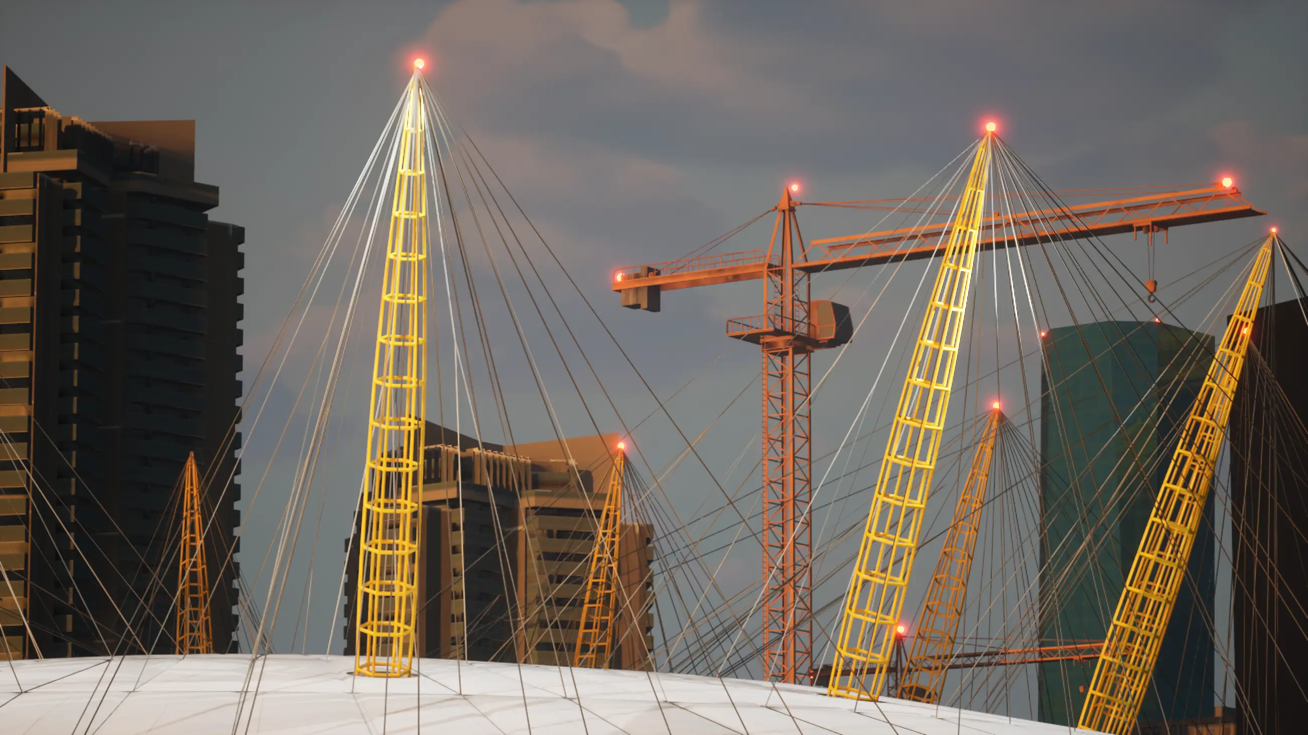 Close-up of yellow-lit support towers and cables on a large dome structure with cranes and modern buildings in the background at dusk.